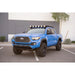 Blue 2016-2023 Toyota Tacoma with Rago round light roof rack mount, front three-quarter