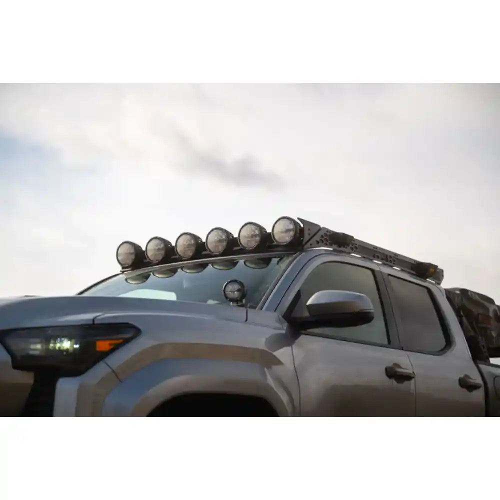 RIGID round lights on Rago roof rack fairing, side close-up