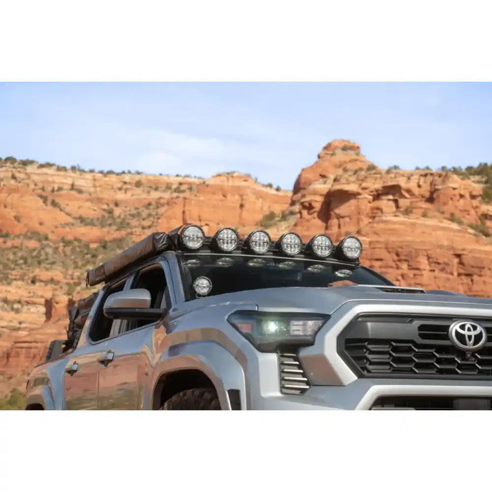 4th Gen Tacoma with Rago RIGID round light mount in Sedona red rocks