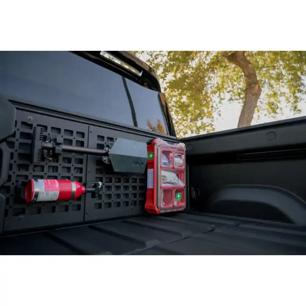 Rago Rivian bed cab Molle panel with fire extinguisher, side view