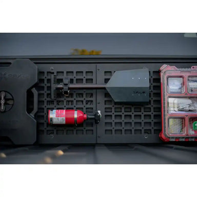 Rago Molle panel with fire extinguisher in Rivian R1T bed
