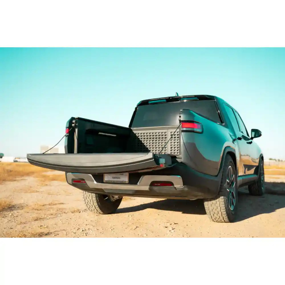 Rivian R1T bed with Rago cab Molle panel, tailgate open