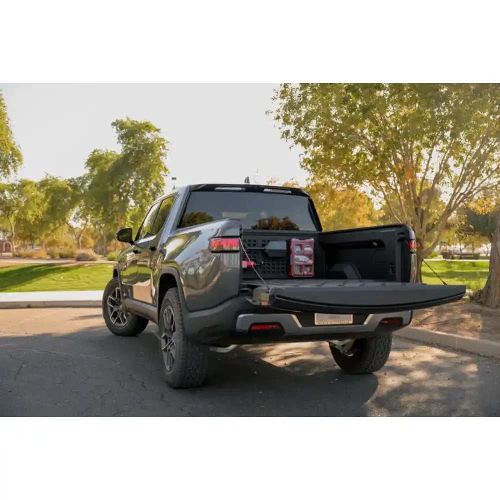Rivian R1T with Rago bed cab Molle panel, rear view