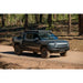 Rivian R1T with Rago chase rack in forest
