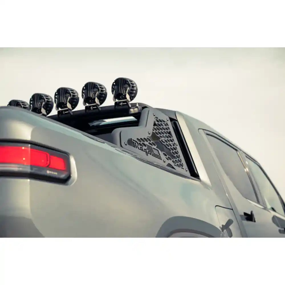 Lights on Rago Rivian chase rack, side angle