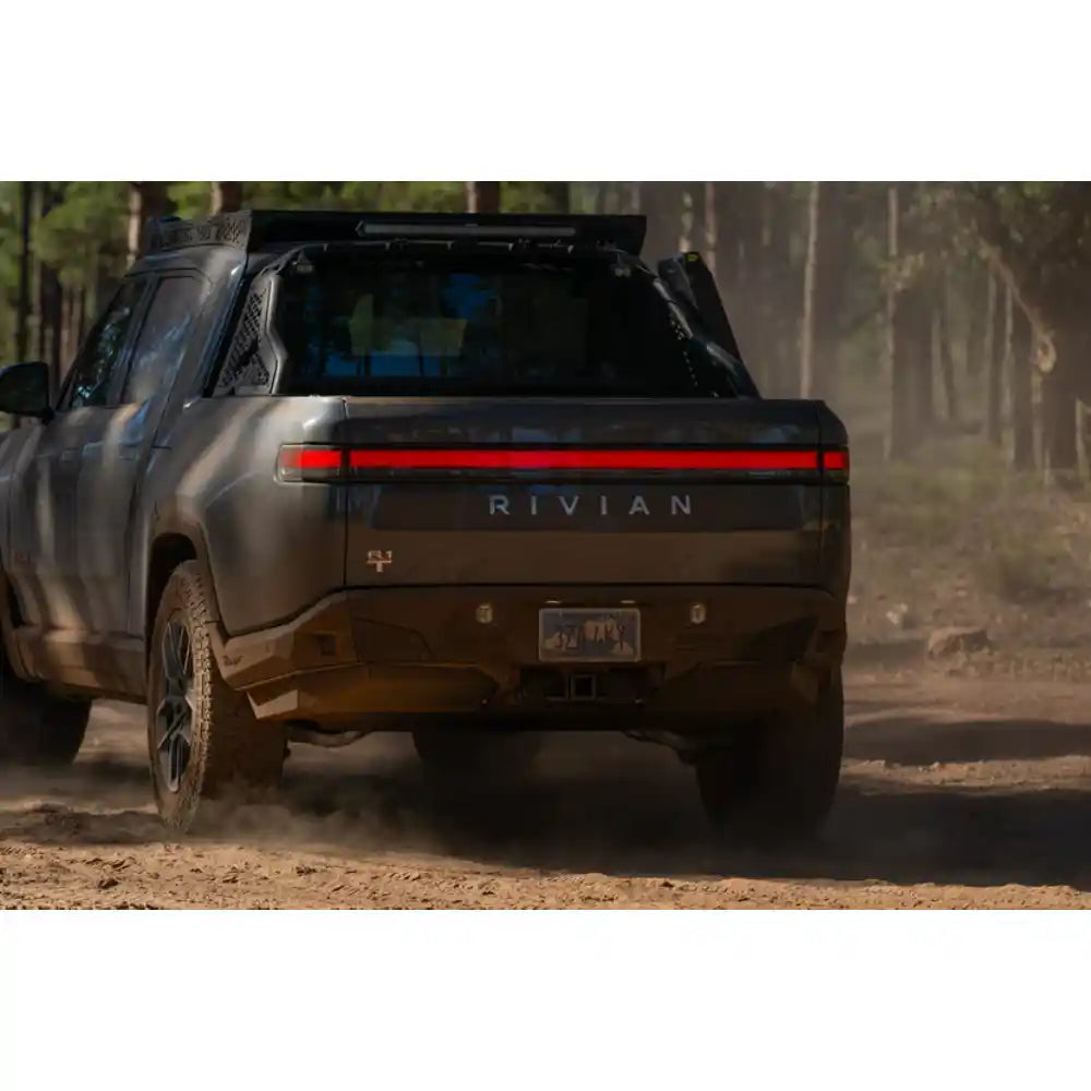 Rivian R1T with Rago chase rack off-road, rear view