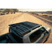 Rago decking panels on Rivian roof rack, elevated angle