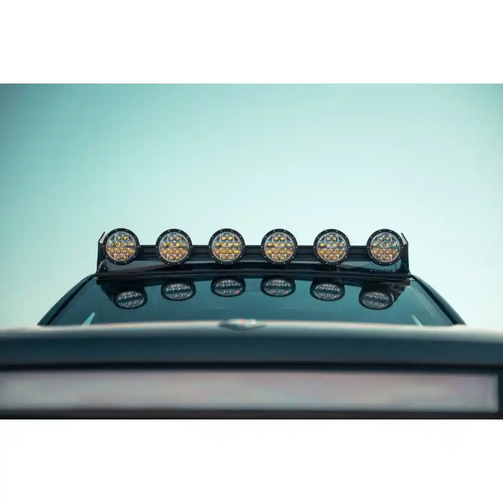 Rago RIGID light mount on Rivian roof rack, front view
