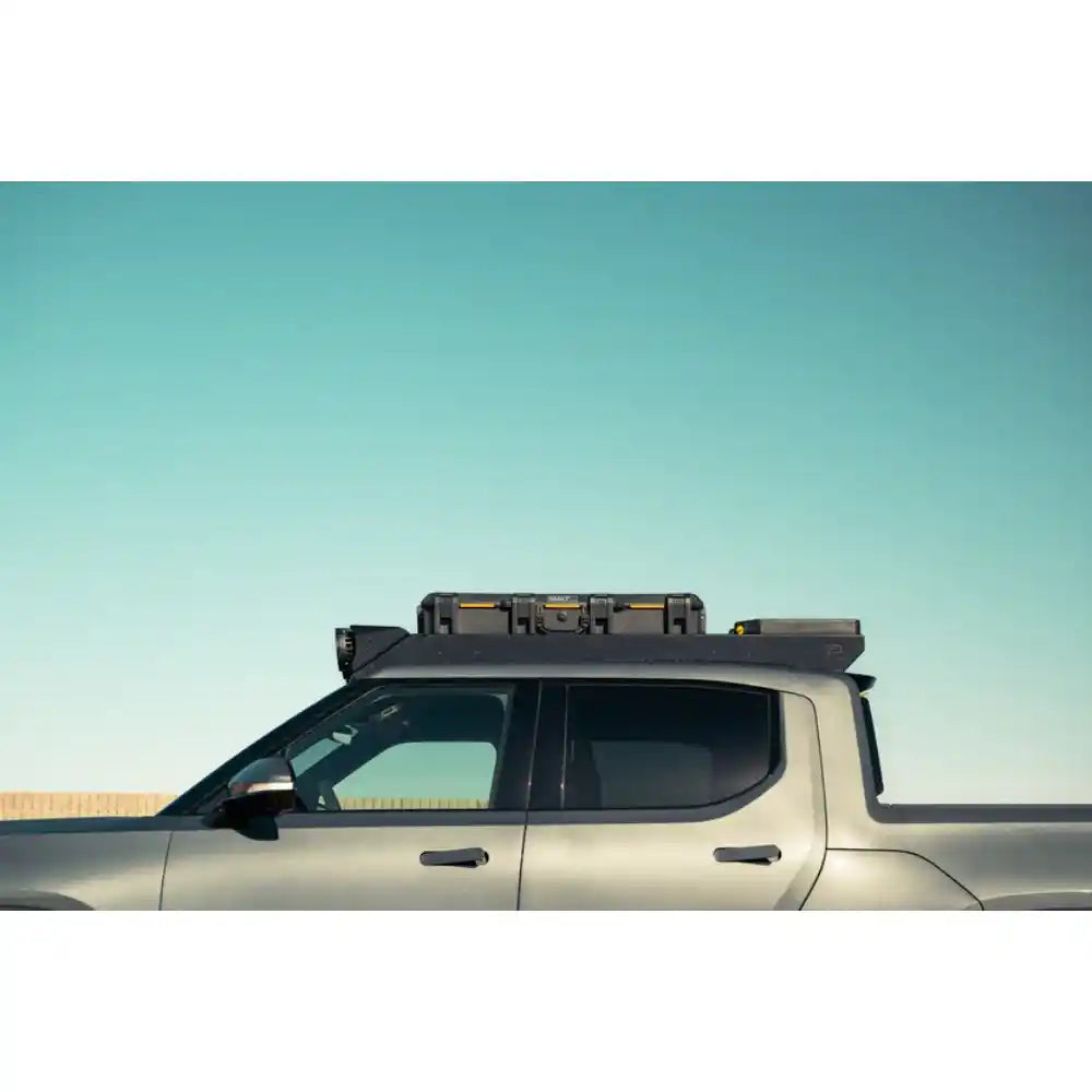 Rago RIGID light mount on Rivian R1T roof rack, side view
