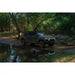 Rivian R1T with Rago roof rack crossing a creek