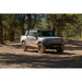 Rivian R1T with Rago roof rack on forest trail, front view