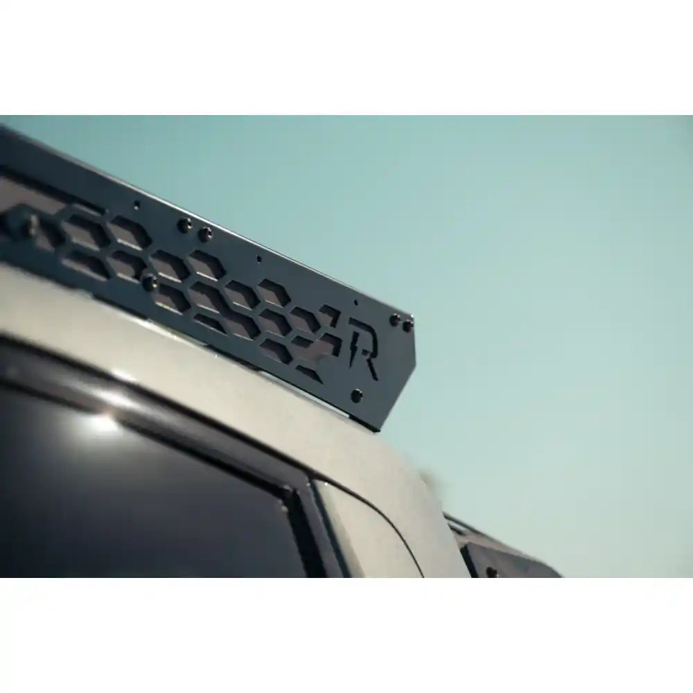 Rago honeycomb pattern side panel on Rivian roof rack