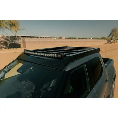 Rago light pocket roof rack above Rivian R1T windshield