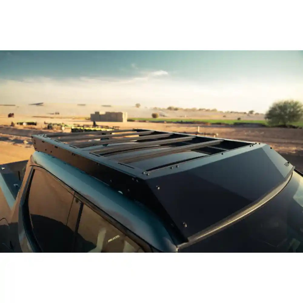 Rago roof rack on Rivian R1T at dusk, top view