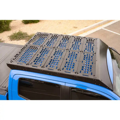 Rago roof rack decking panels on blue 3rd Gen Toyota Tacoma, top view