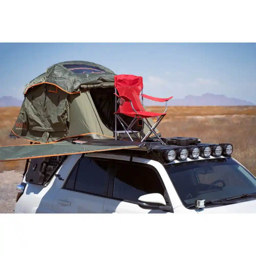 Rooftop tent and camp chair on Rago roof rack decking panels
