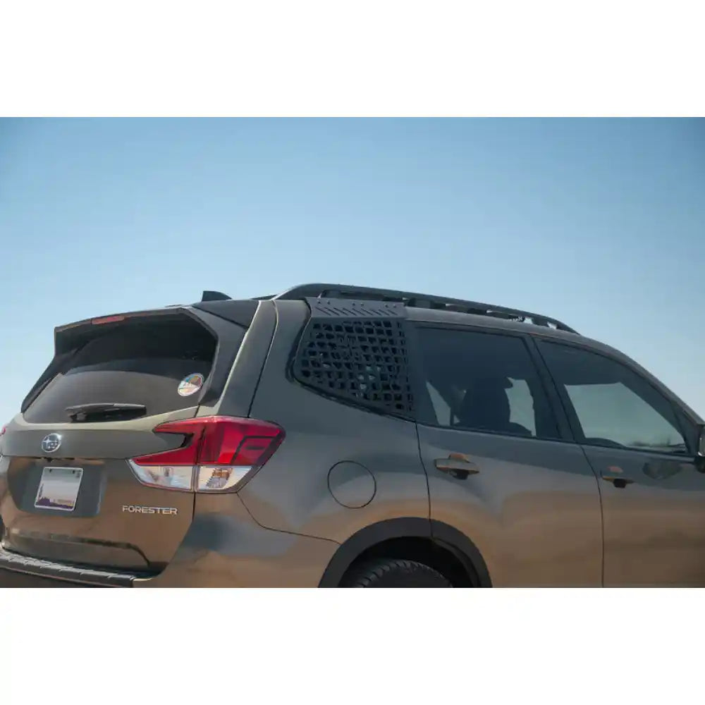 Subaru Forester rear three-quarter view with Rago exterior Molle panel