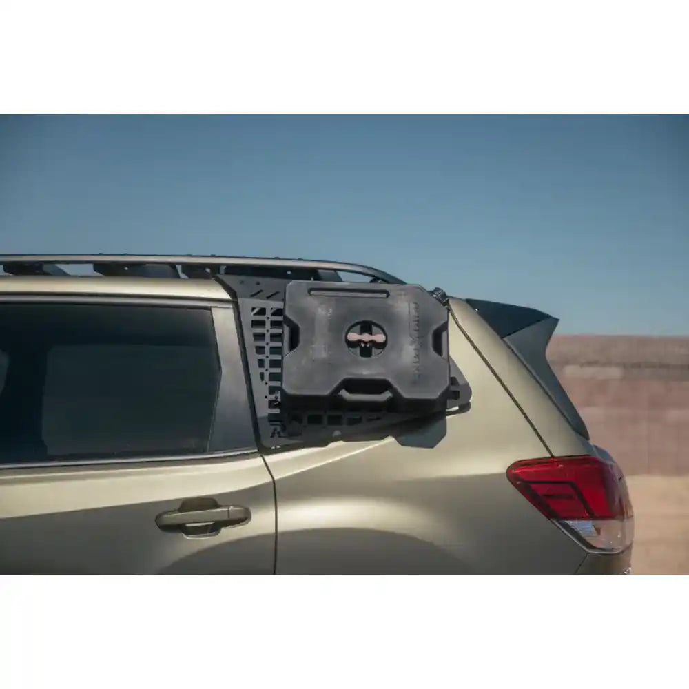 Rago exterior Molle panel with RotopaX mount on Subaru Forester rear window