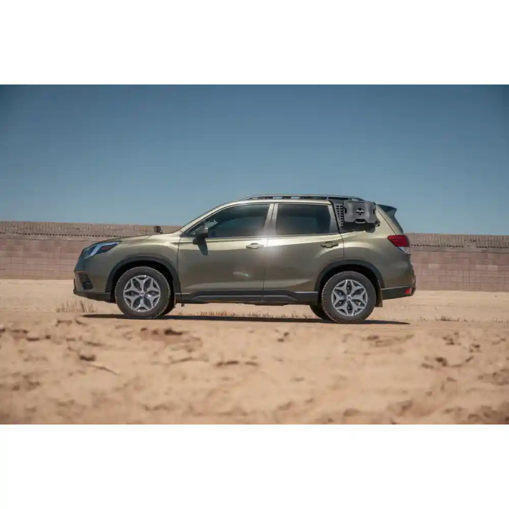 Subaru Forester with Rago exterior Molle panels, side profile in desert
