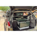 Subaru Forester cargo area with Rago Molle shelf above cooler and bags