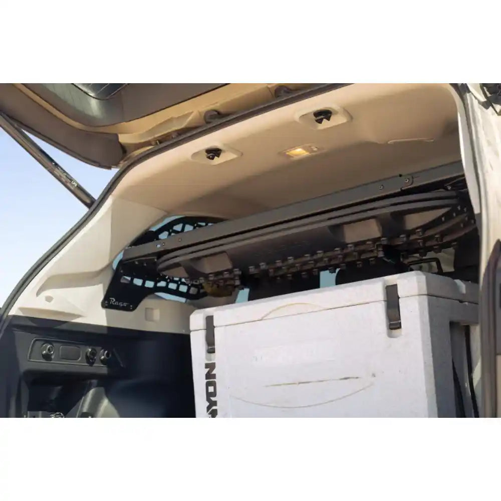 Rago Molle panels and shelf above cooler in Subaru Forester trunk