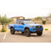 Blue 2016-2023 Tacoma with Rago light pocket roof rack, front three-quarter