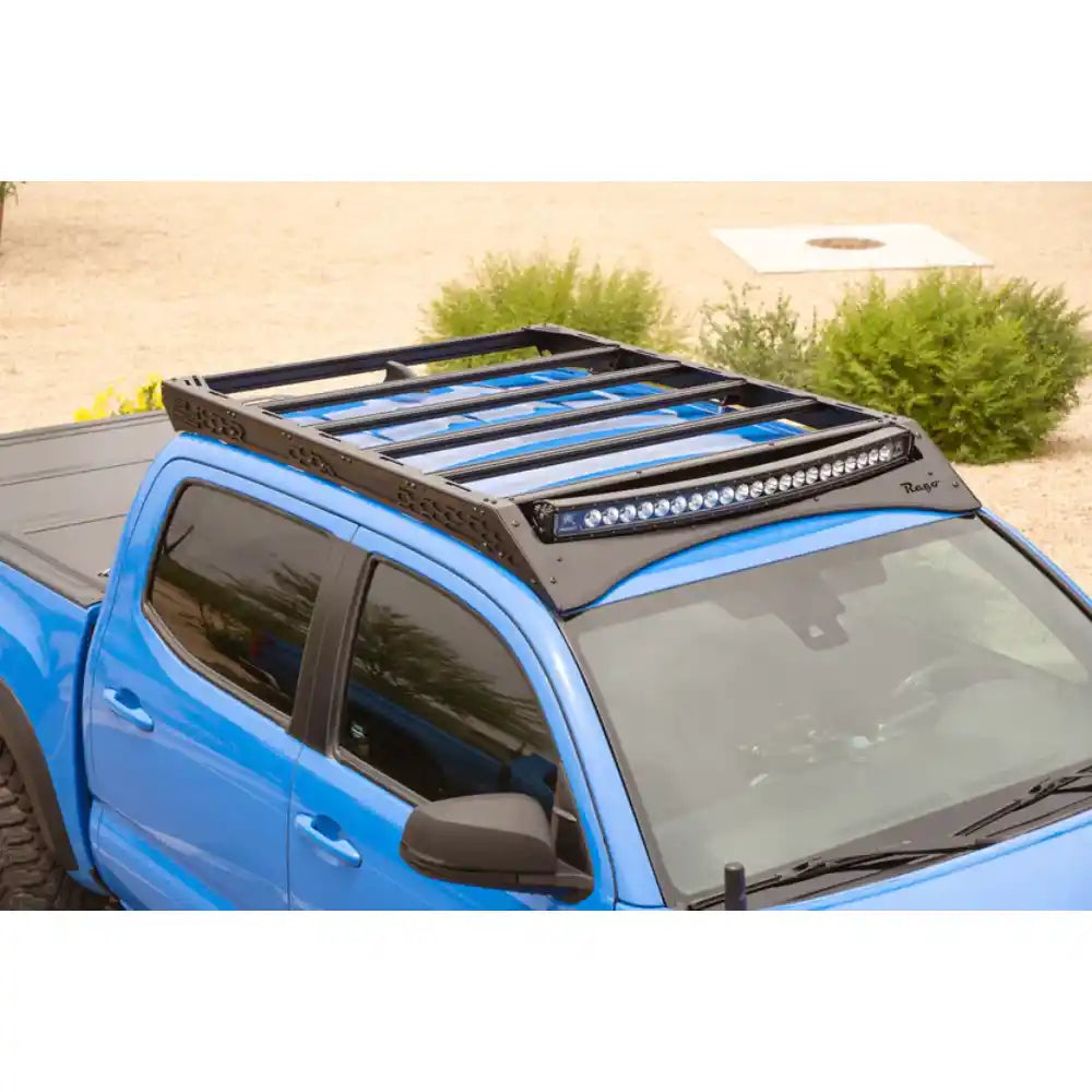 Rago light pocket roof rack with light bar on blue 3rd Gen Tacoma, top angle