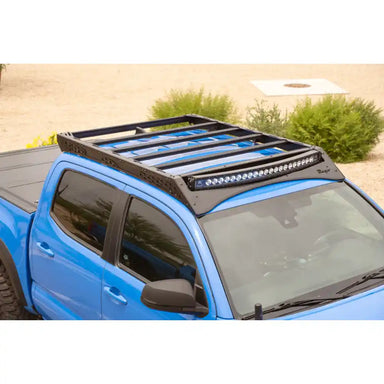 Rago light pocket roof rack with light bar on blue 3rd Gen Tacoma, top angle