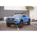 Blue 2016-2023 Tacoma with Rago roof rack and round lights, front three-quarter