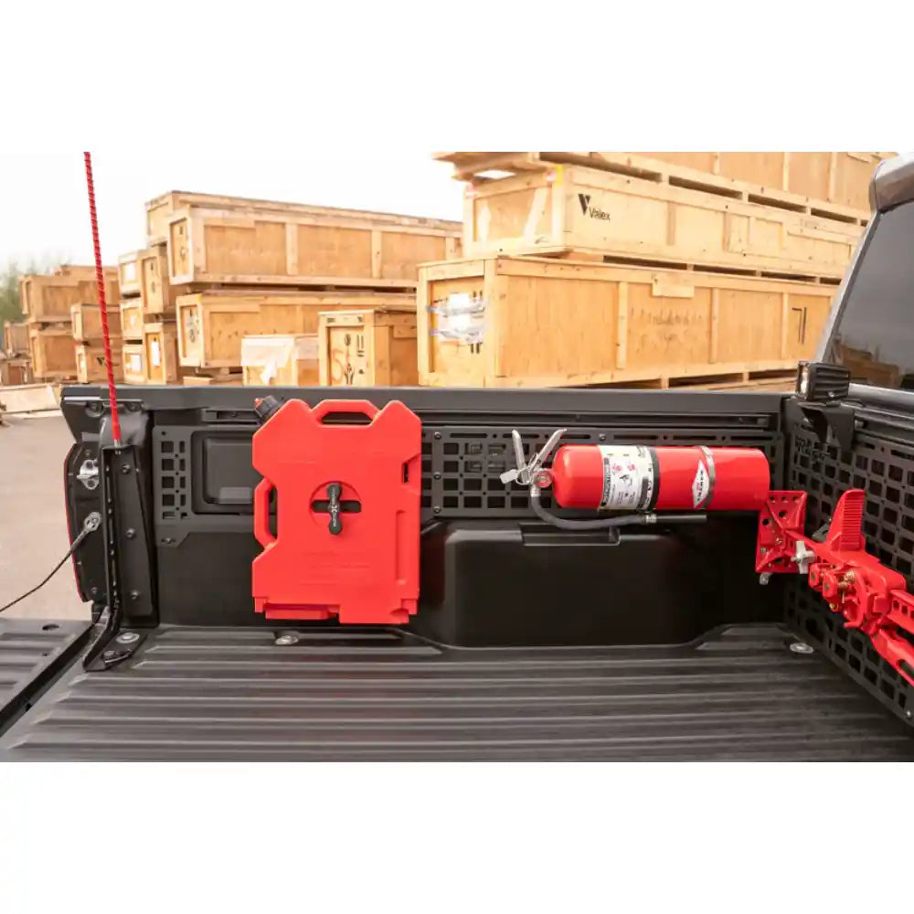 Rago Tacoma bed side Molle panels with red fuel can