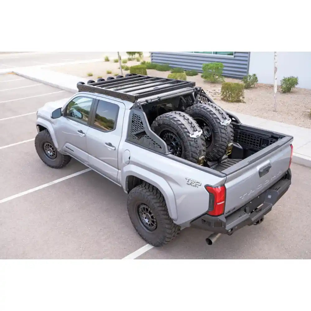 2024 Tacoma with Rago chase rack, aerial front three-quarter