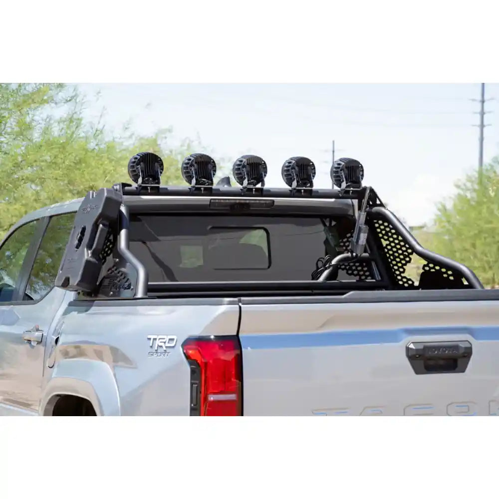 Round lights on Rago Tacoma chase rack, side angle