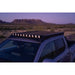 2024 Tacoma at dusk with pod lights in Rago roof rack light pocket