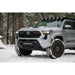 Toyota Tacoma in snow with Rago light pocket roof rack