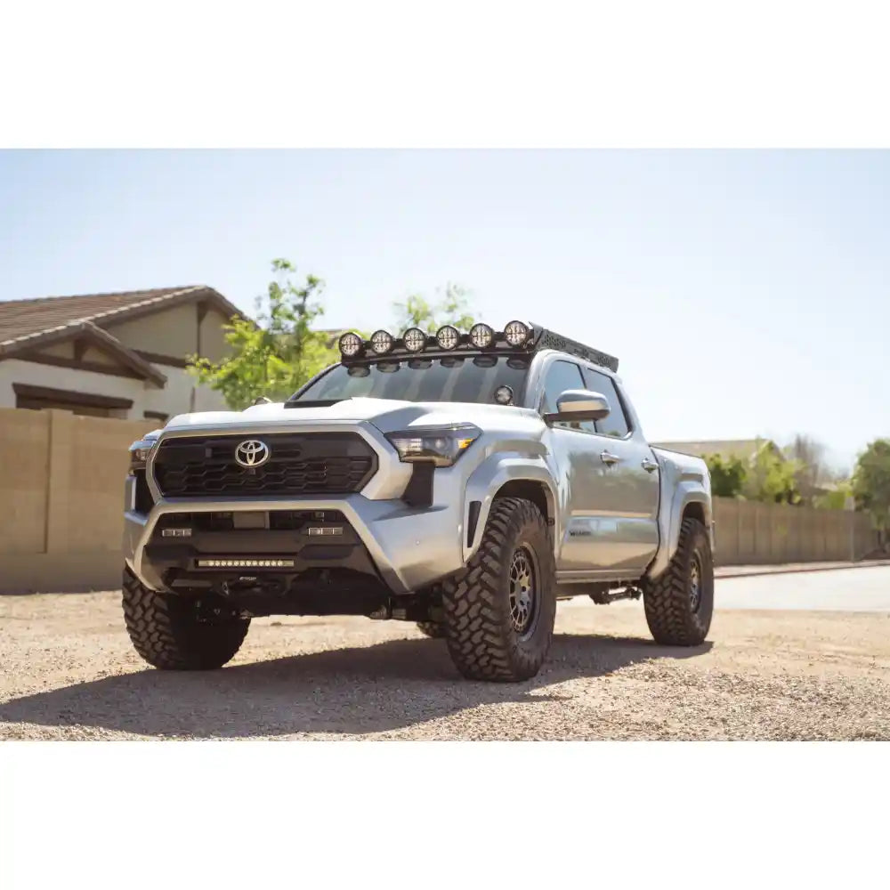 4th Gen Toyota Tacoma with Rago roof rack and round lights, front three-quarter