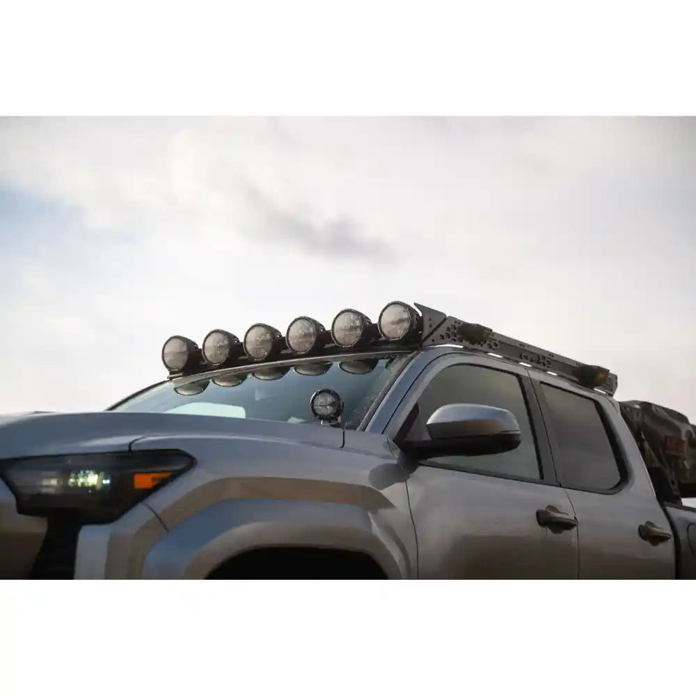 Round lights on Rago Tacoma roof rack, side close-up