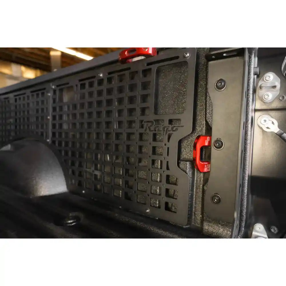 Rago Tundra bed side Molle panels with fire extinguisher, close-up