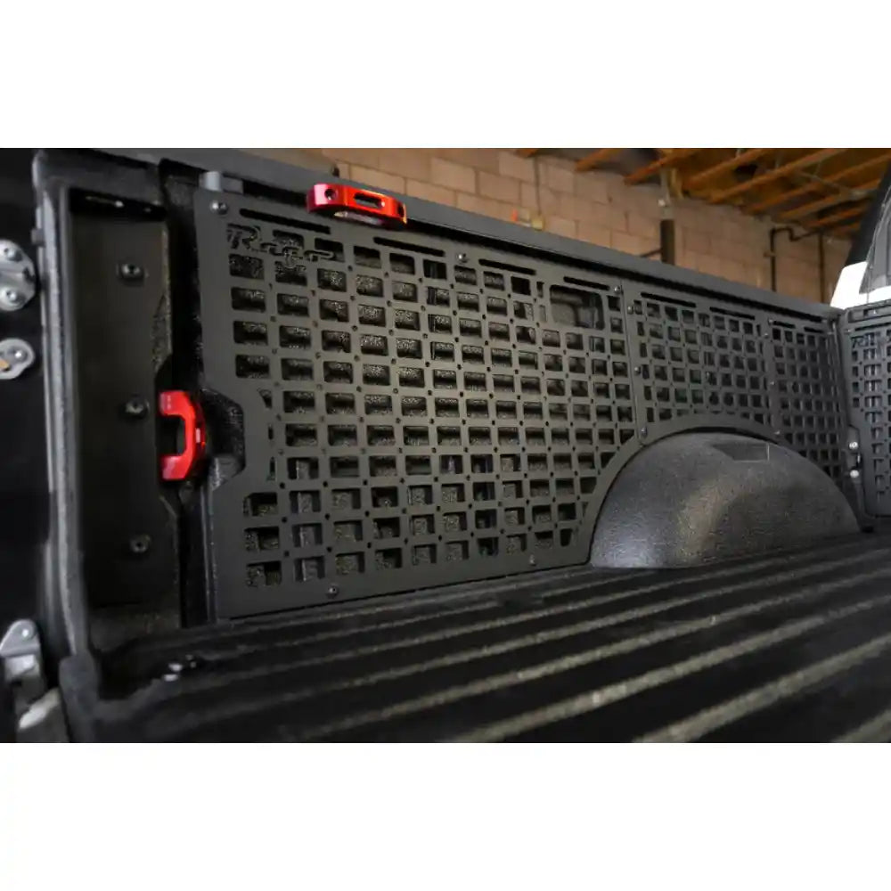 Rago Tundra bed side Molle panels with gear mounted