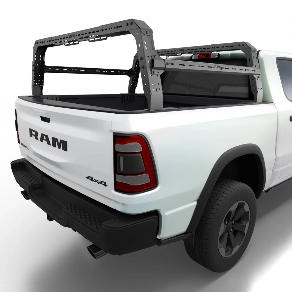 White RAM truck with a black bed rack on a white background