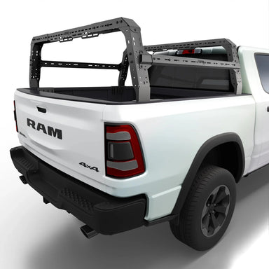 White RAM truck with a black bed rack on a white background