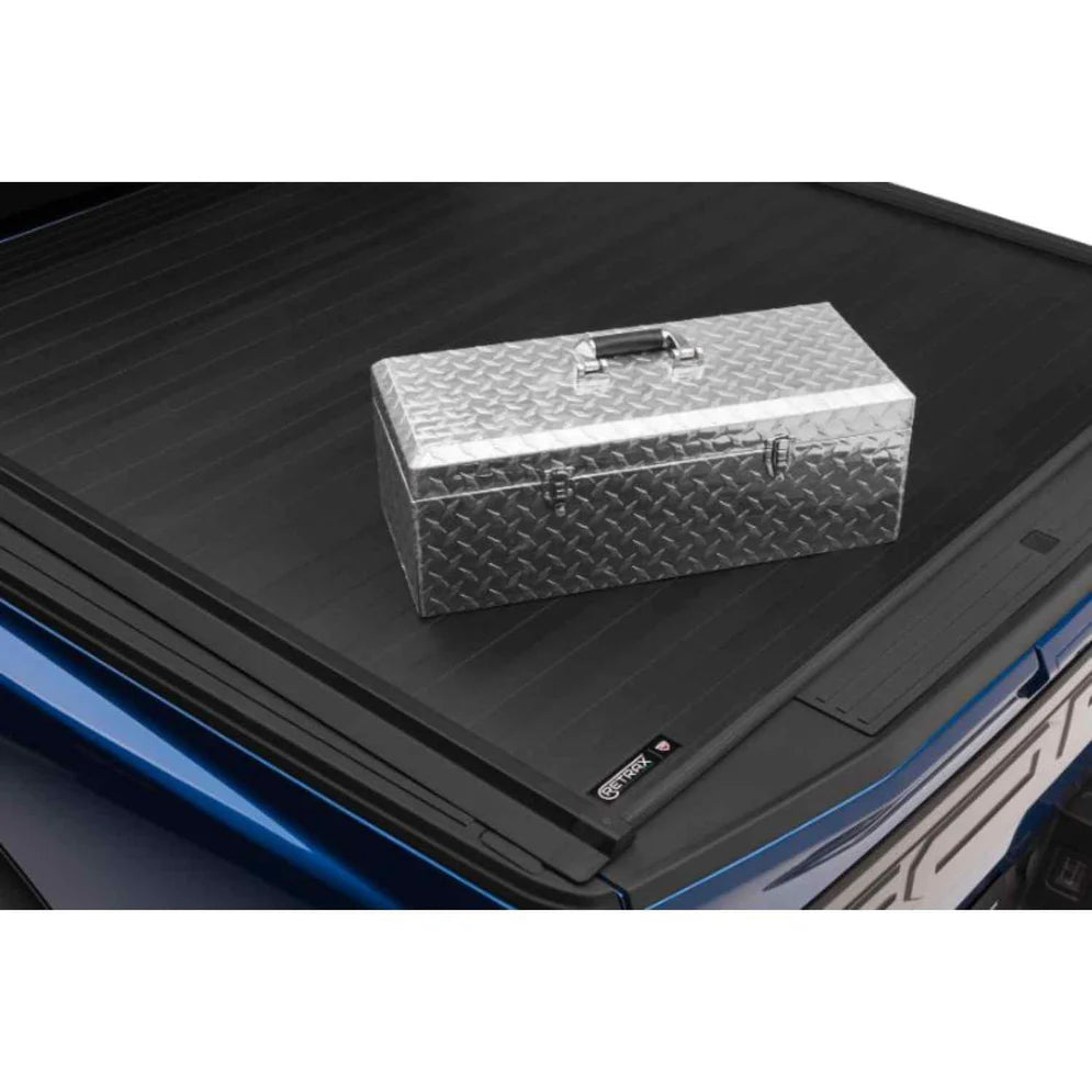 Retrax IX ford tonneau cover with cargo box on it