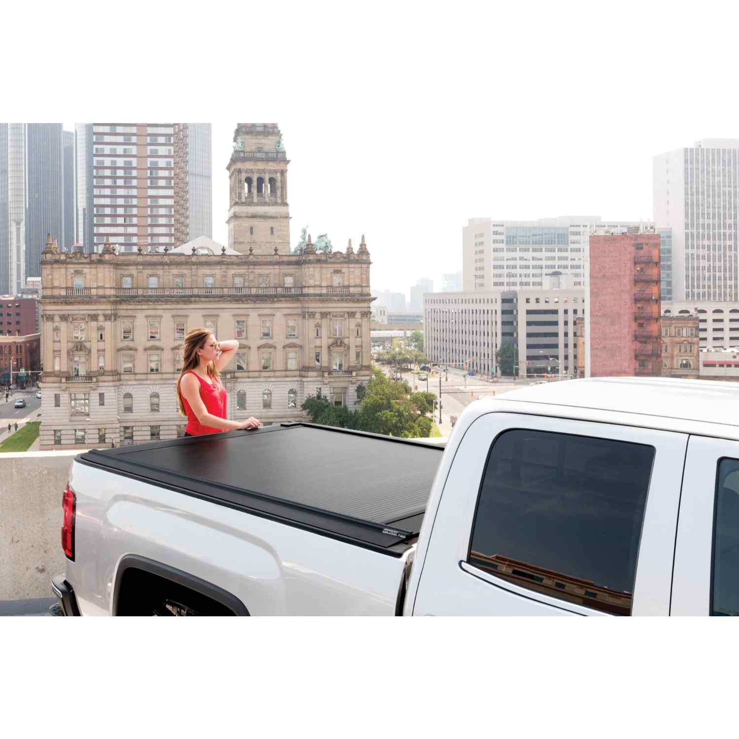 RetraxPRO MX 2009-2014 Ford F-150 Super Crew and Super Cab Electric Tonneau Cover White truck Lifestyle Image