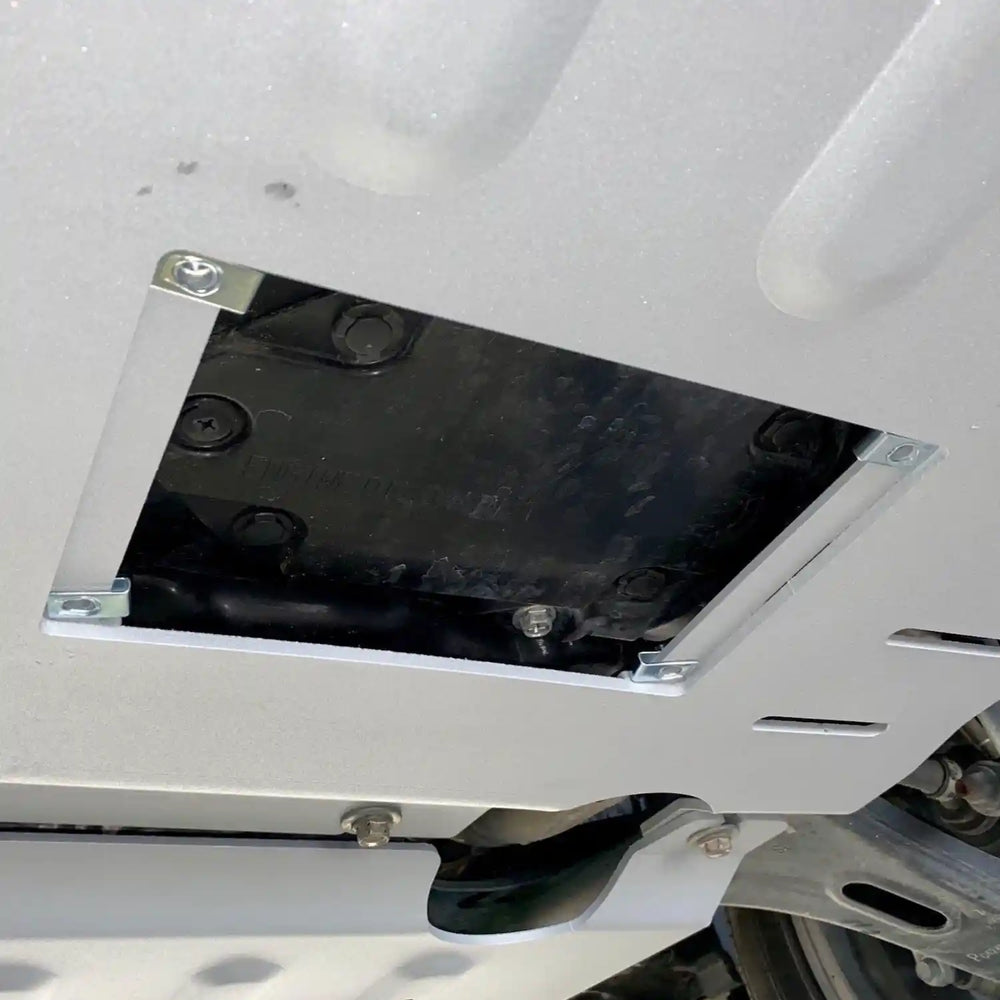 open hatch view of the Rival engine skid plate