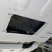 open hatch view of the Rival engine skid plate