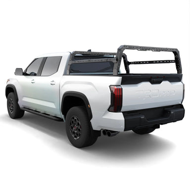 White TRD Pro truck with a shiprock bed rack on a white background