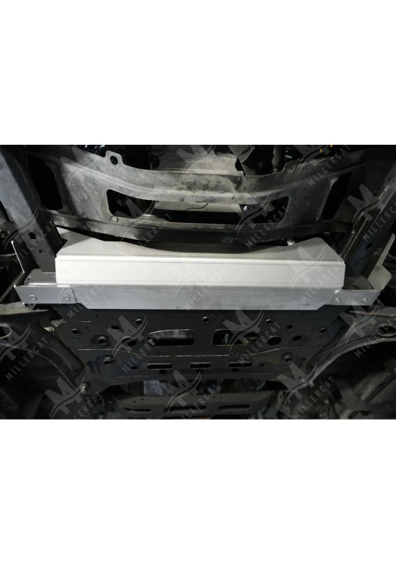 Underside view of transit showing MILLERCAT Cat Shield installed