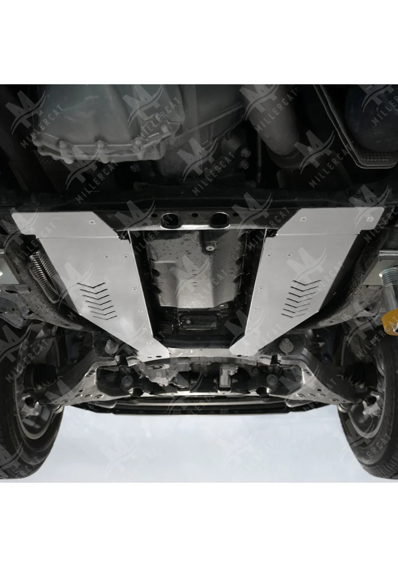 Undercarriage of a Tundra with CAT protective guard.