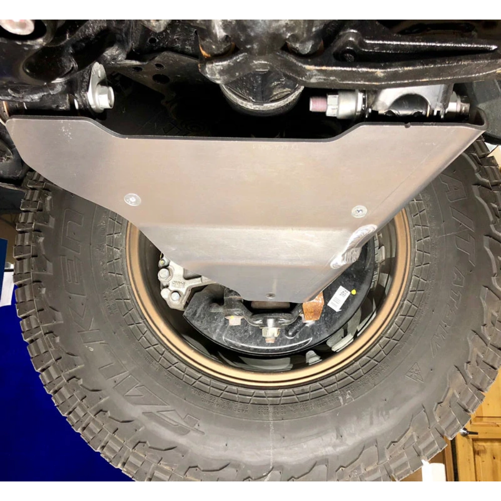 close-up of installed lower a-arm skid plate on Tacoma